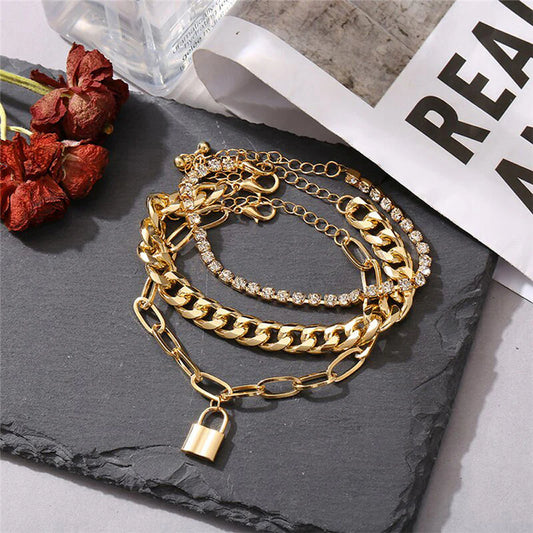 Shimmering Gold Layered Bracelets – Set of 3
